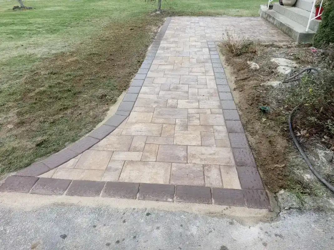 New stone pathway leading to home entrance.